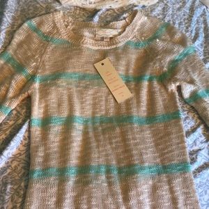 Cute off- white sweater!